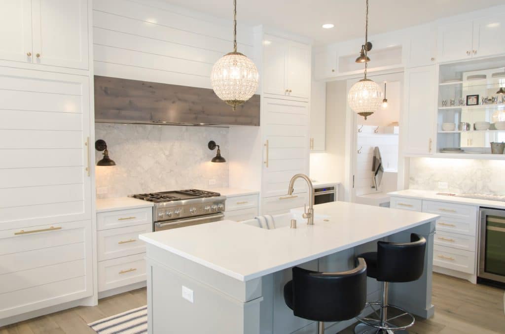 Contemporary kitchen with white cabinets.