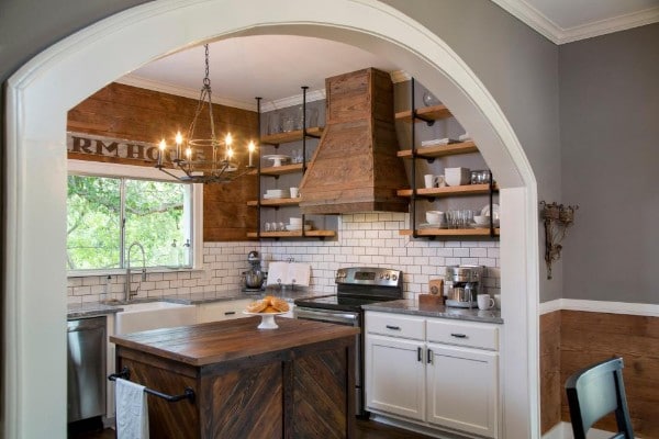 Kitchen with beautiful custom wood shelves.